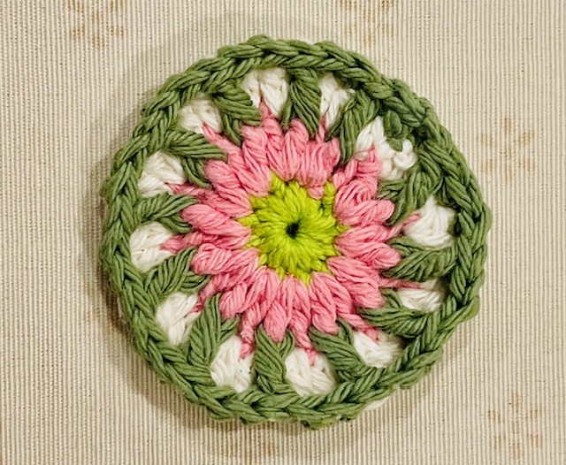 Pink daisy crochet coaster